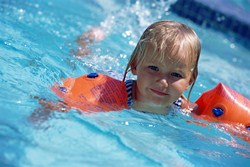 image of child swimming